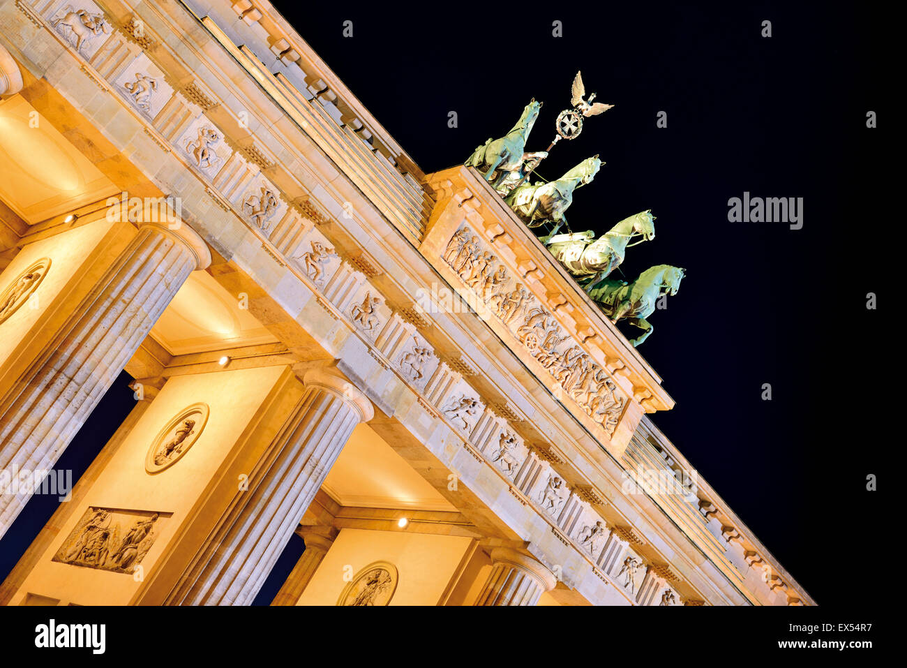 Germany, Berlin: Detail of the nocturnal illuminated Brandenburg Gate Stock Photo
