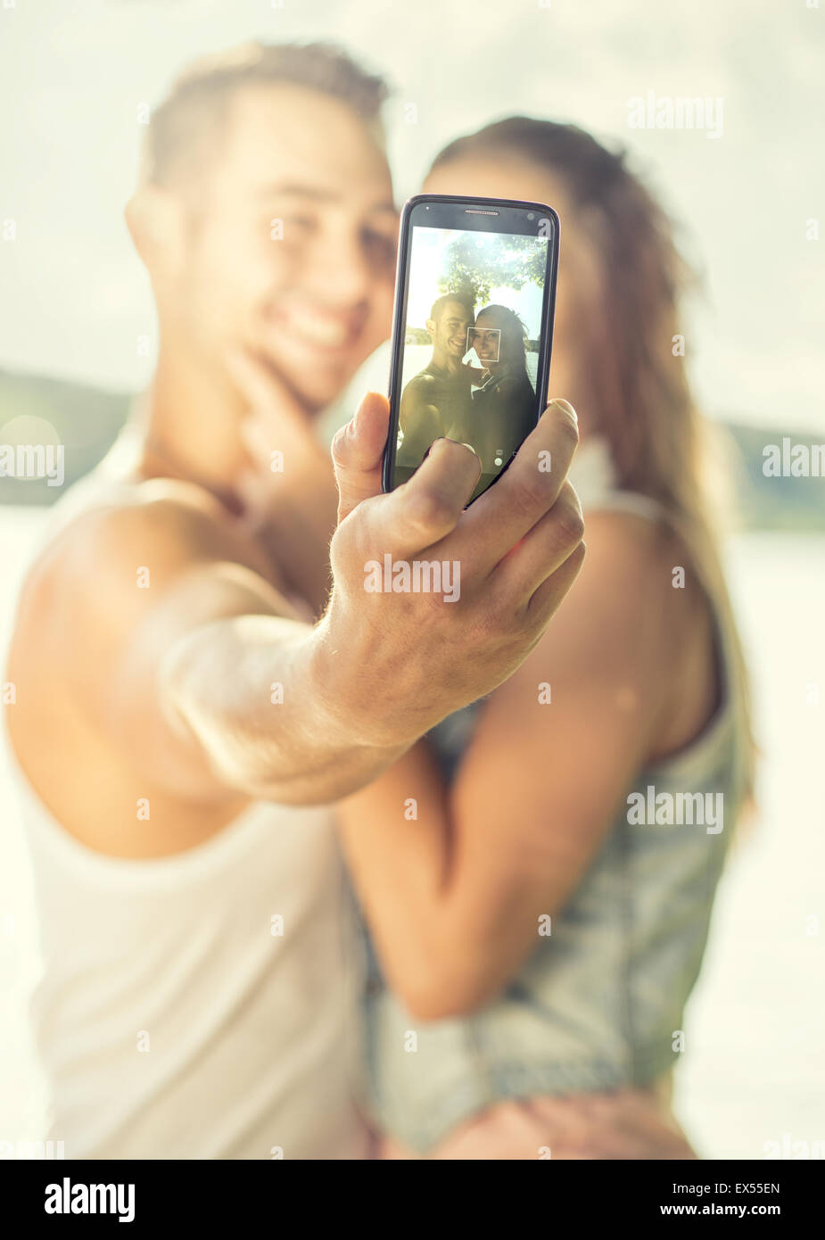 Couple in love on the lake, close-up, selfie Stock Photo