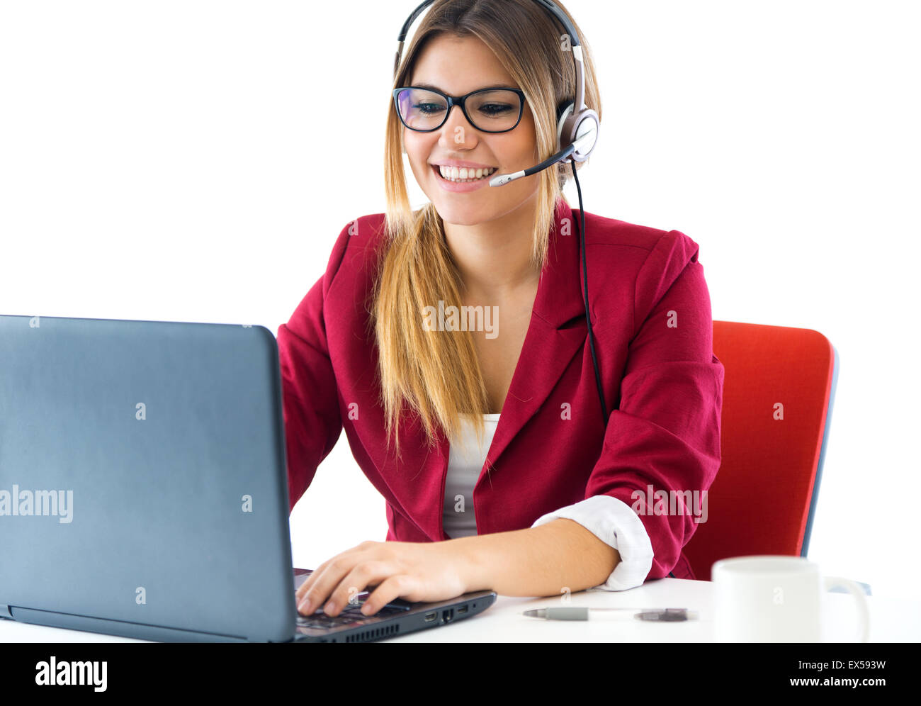 Portrait of young business girl using her computer. Stock Photo