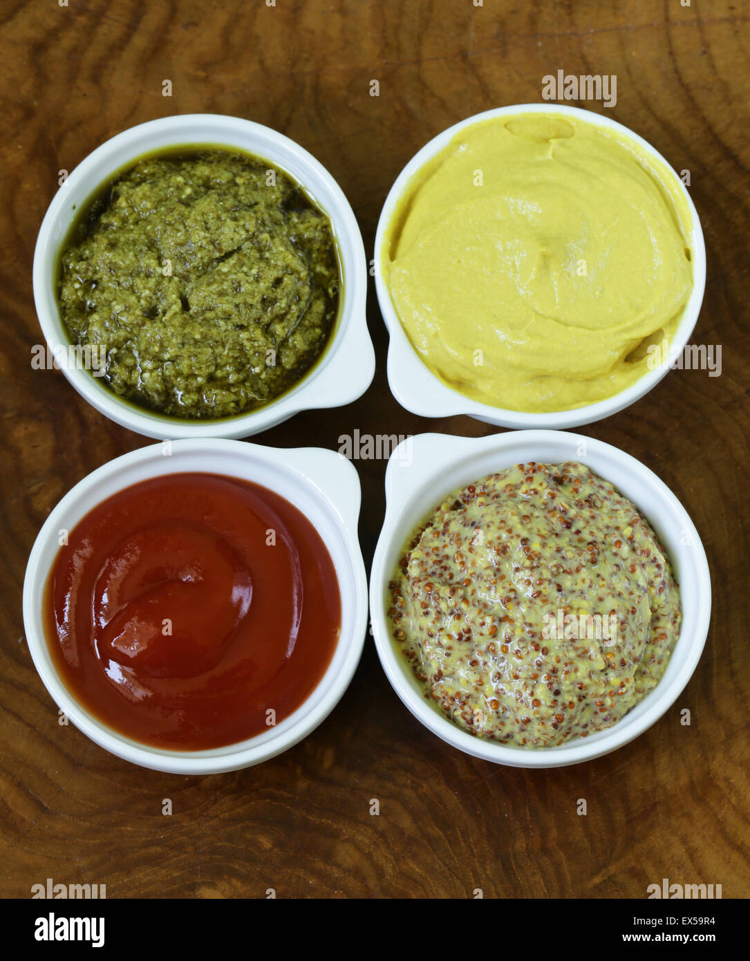 different types of sauces ketchup, mustard, pesto Stock Photo Alamy