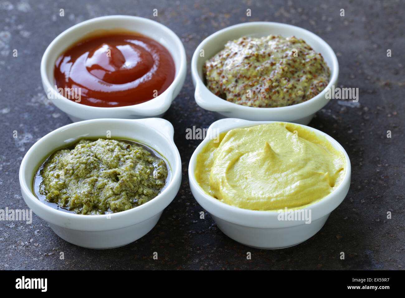 different types of sauces ketchup, mustard, pesto Stock Photo Alamy