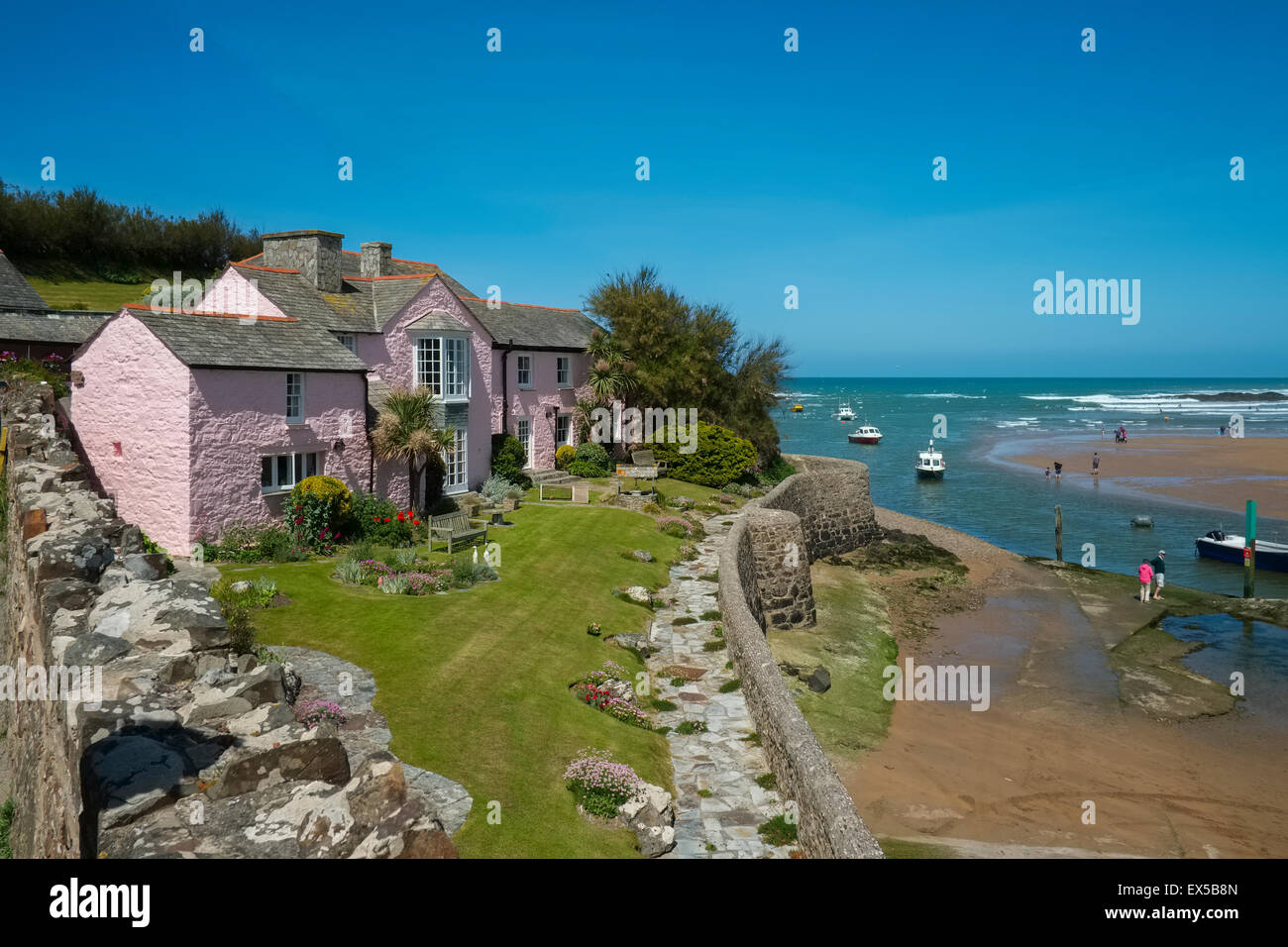 A pink cottage overlooking Summerleaze beach at Bude, Cornwall, England