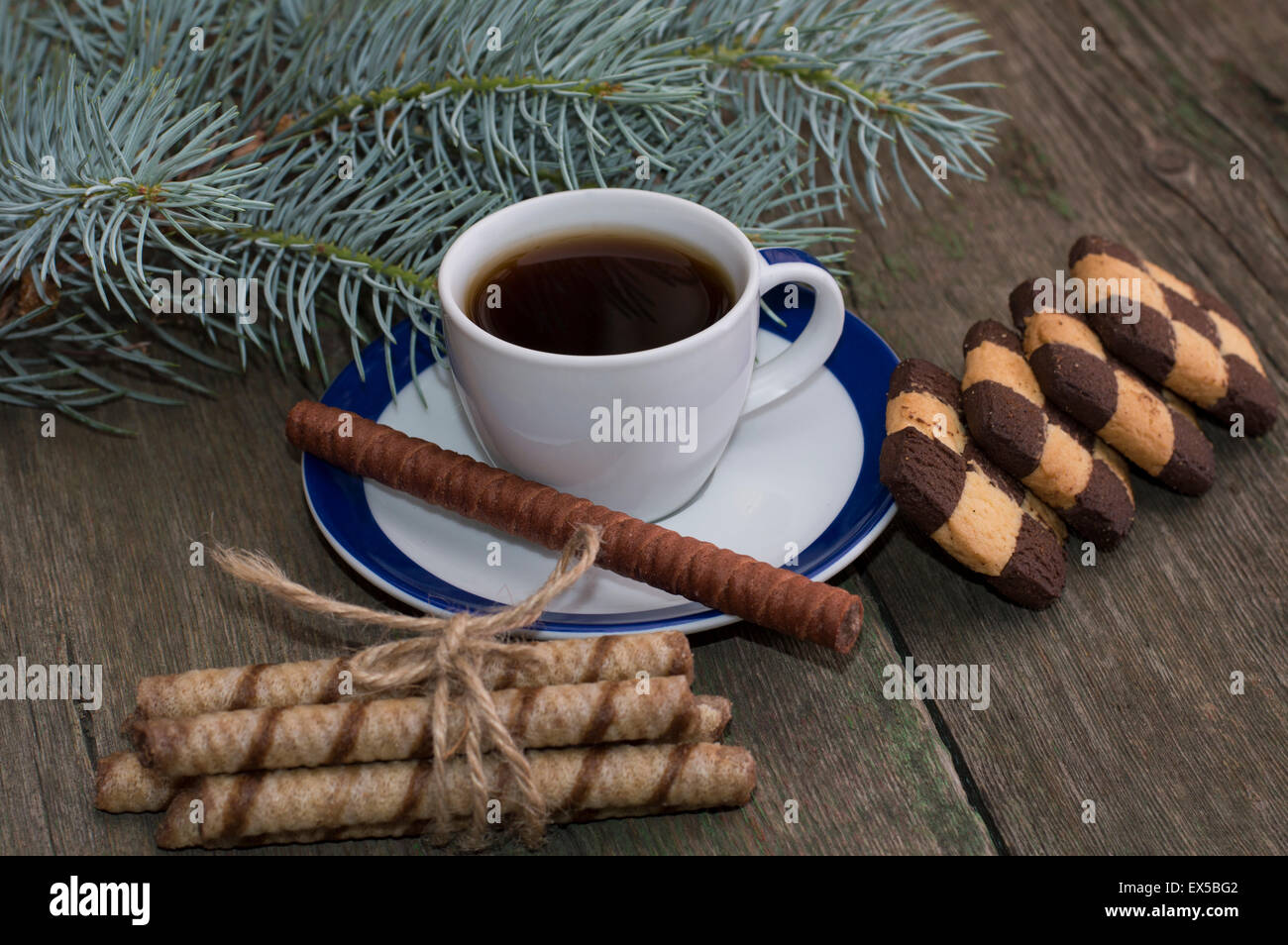 coffee with cookies and a fir-tree branch Stock Photo