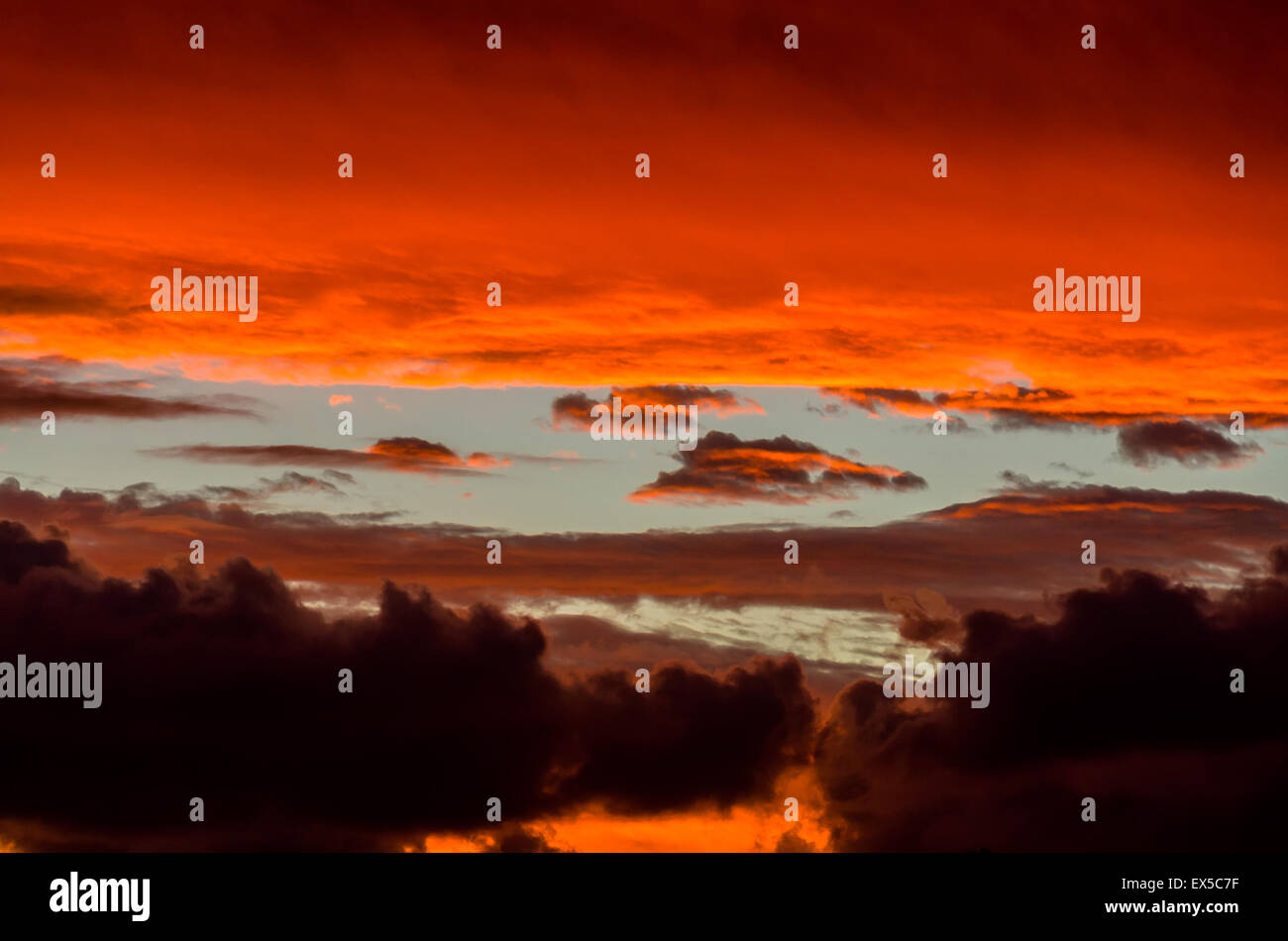 Dramatic stormy red orange sunset hi-res stock photography and images ...
