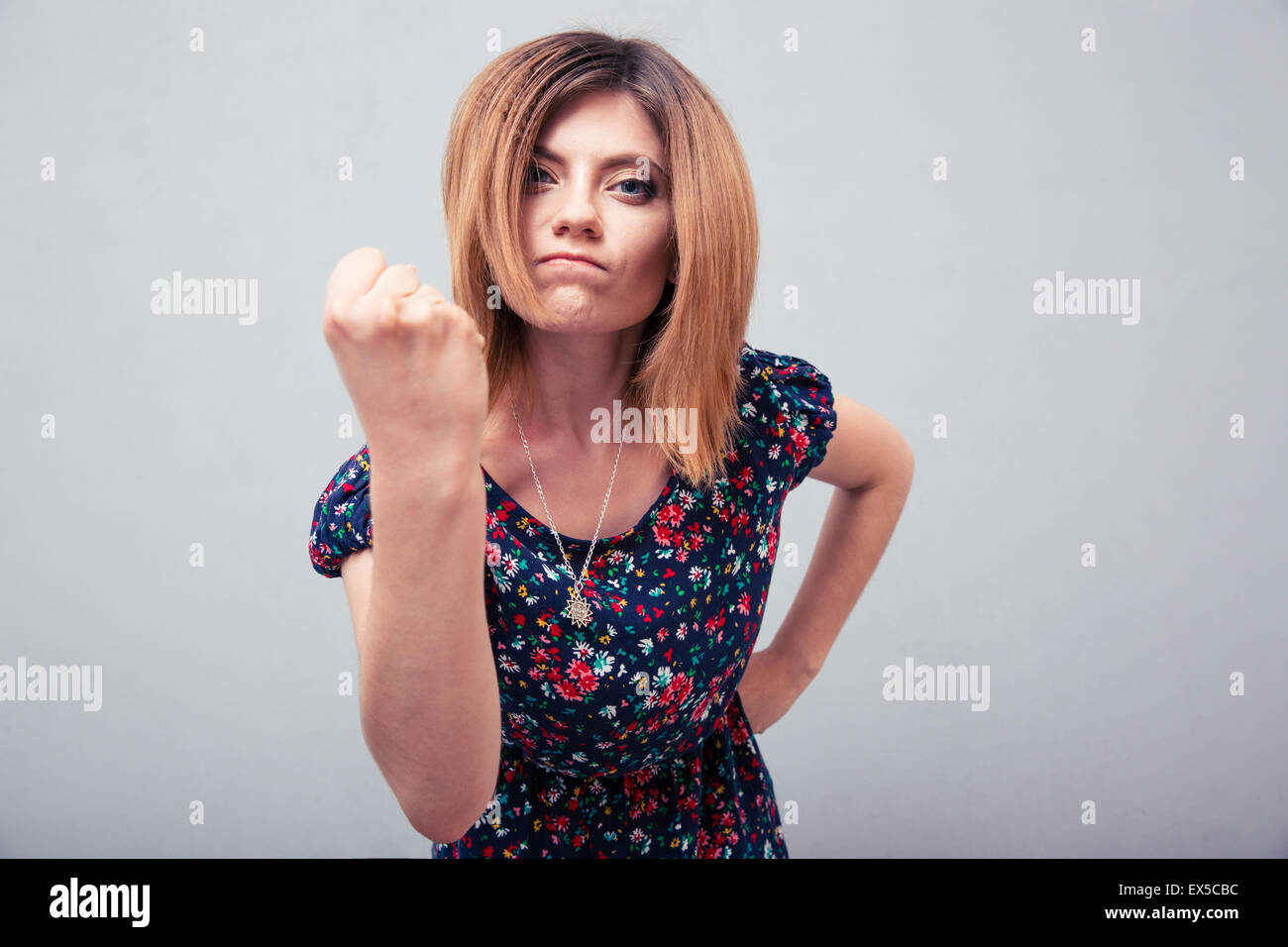 Anger woman fist hi-res stock photography and images - Alamy