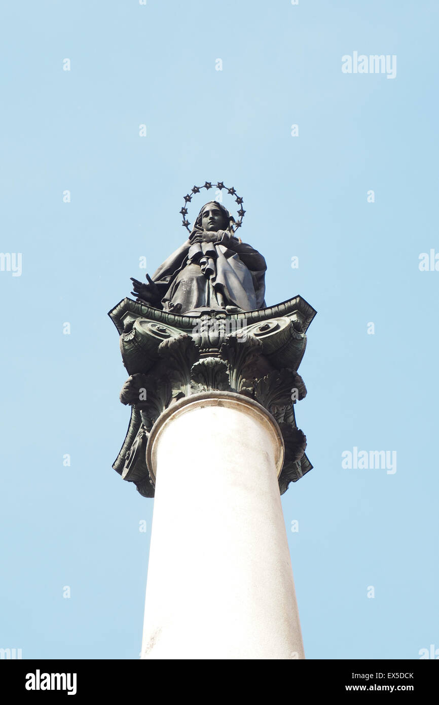 Statue of the Virgin Mary atop of a column. Stock Photo