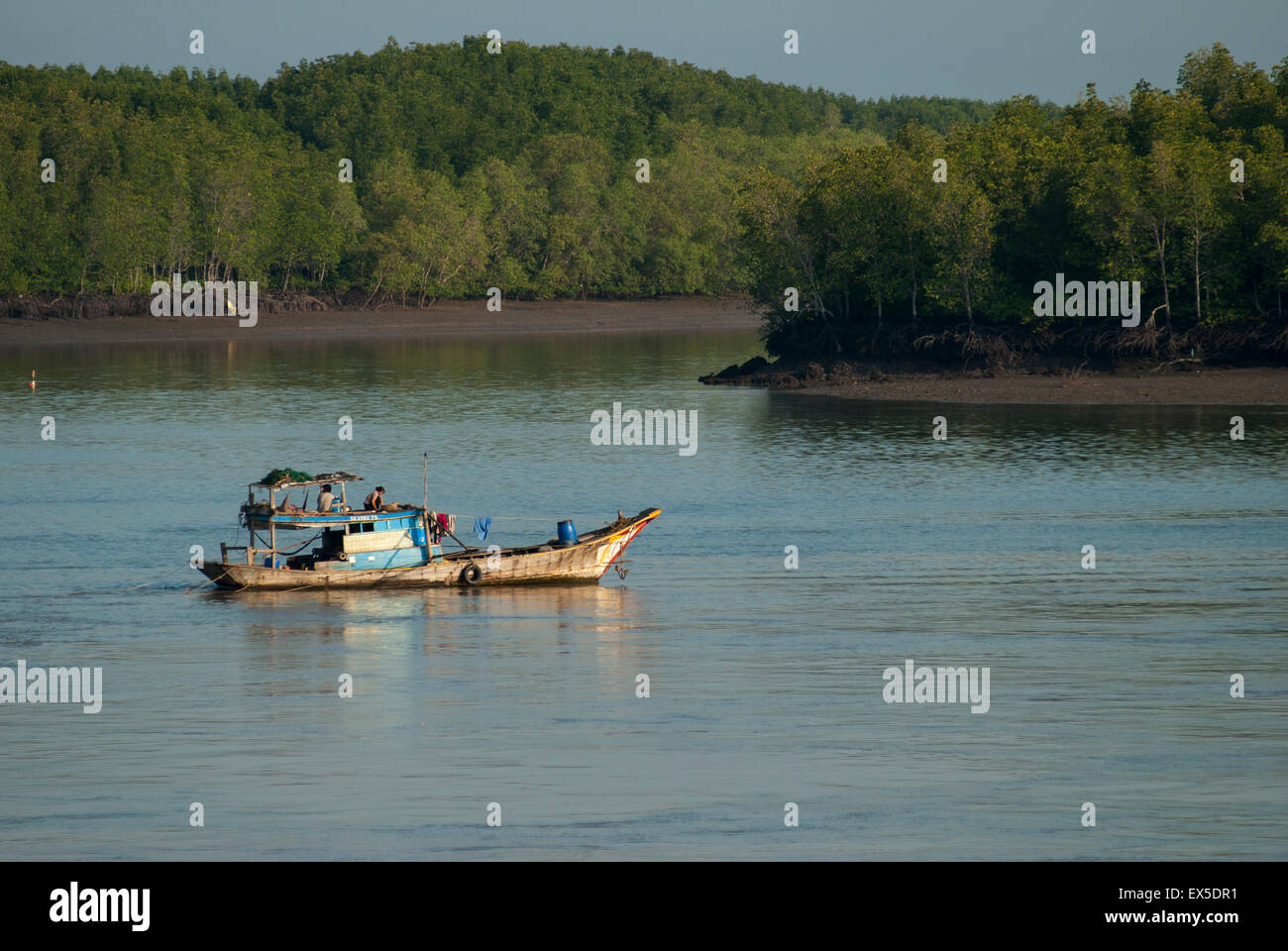 Fishing boats in the Saigon river near Ho Chi Minh City, Vietnam Stock Photo