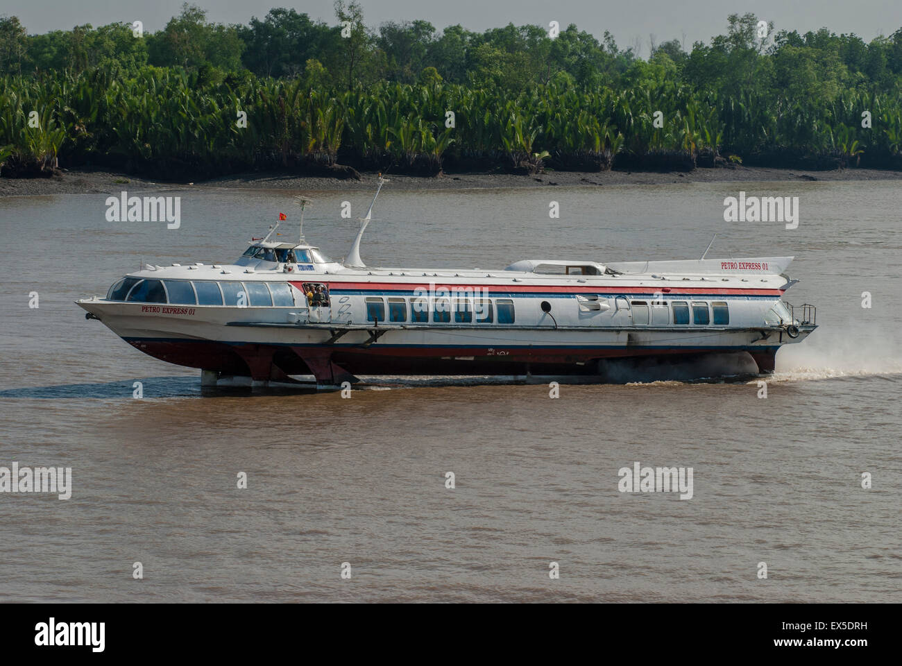 Hydrofoil ferry  in the Saigon river near Ho Chi Minh City, Vietnam Stock Photo