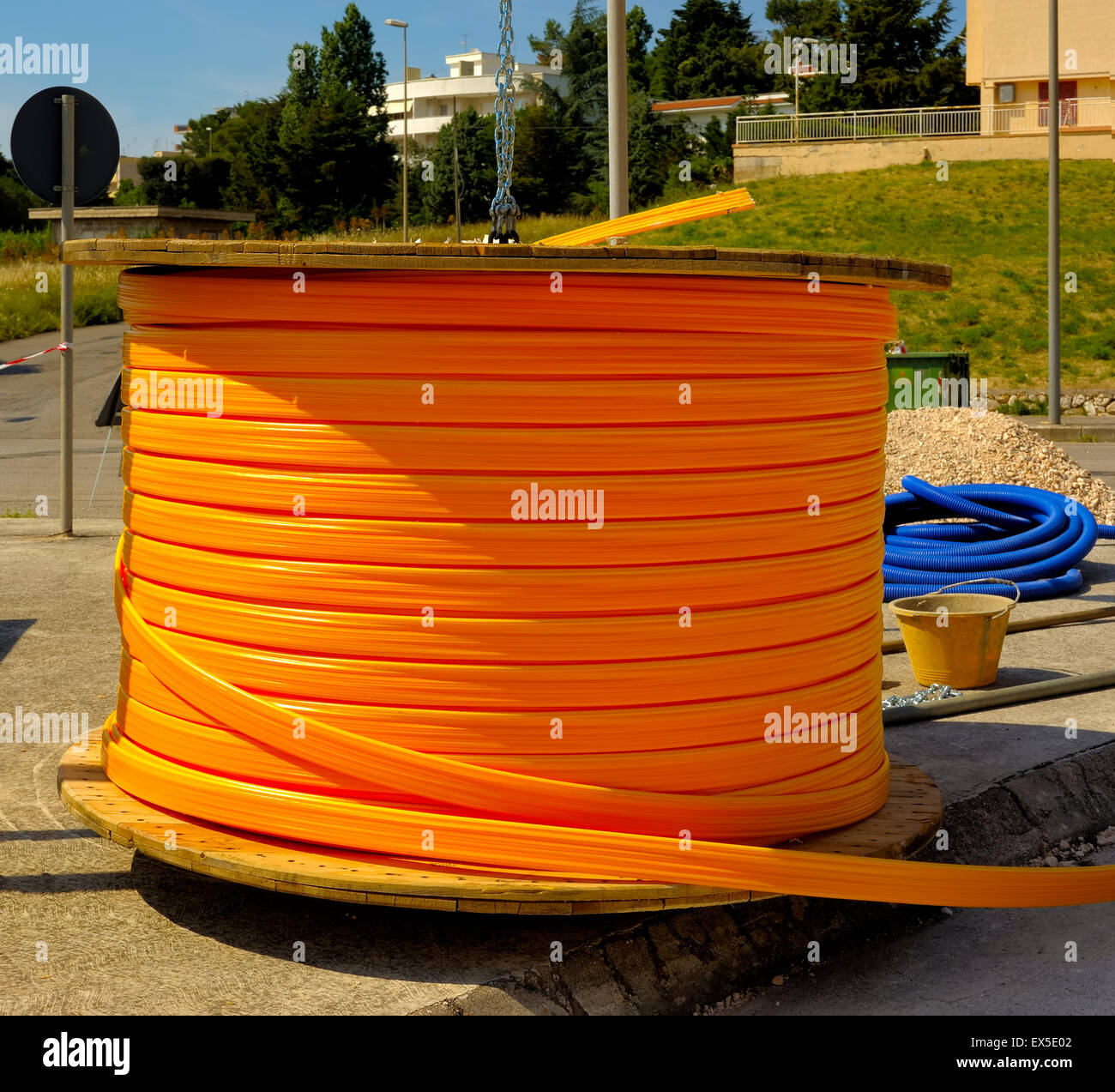 Industrial cable drums of fiber optic cables from underground in a