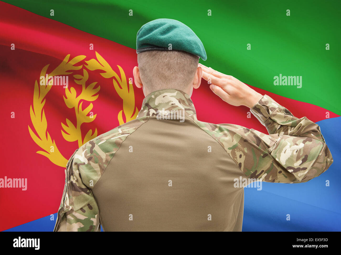 Soldier in hat facing national flag series - Eritrea Stock Photo