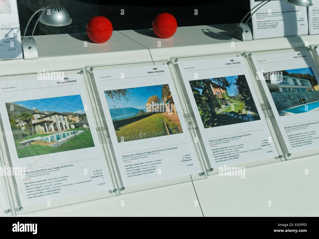 Lake Como houses for sale in estate agents window , Cernobbio, Italy