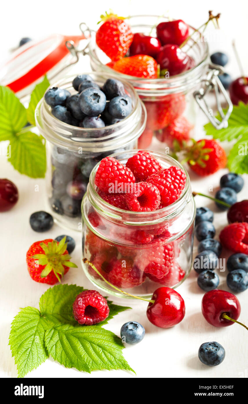 Summer berries in glass jar Stock Photo Alamy
