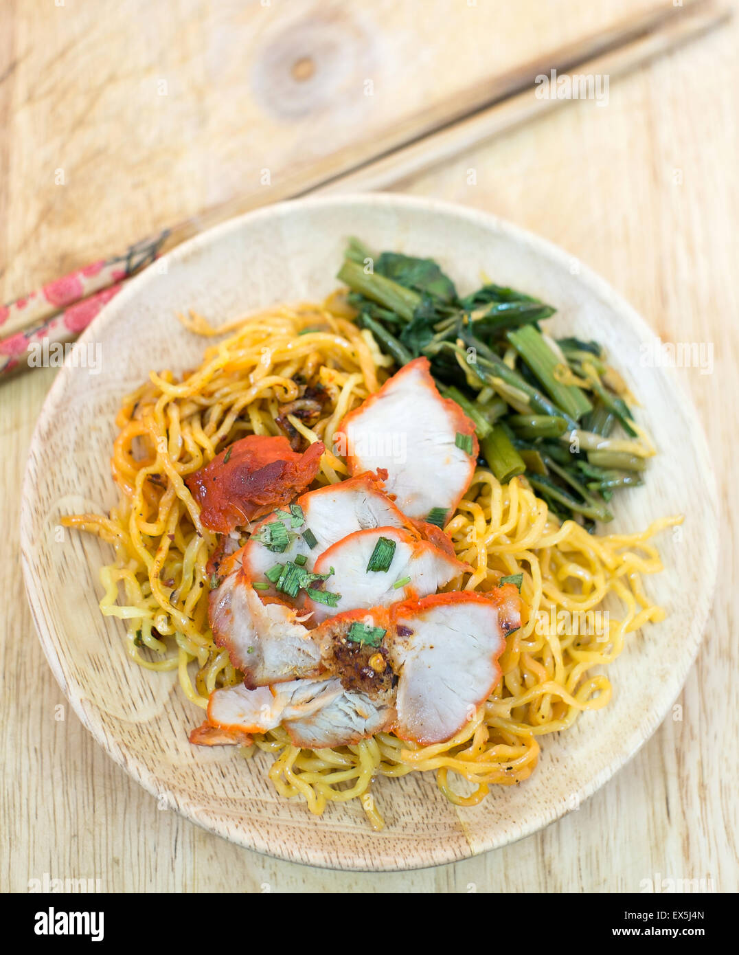 Chinese egg noodles with red pork and vegetables Stock Photo Alamy