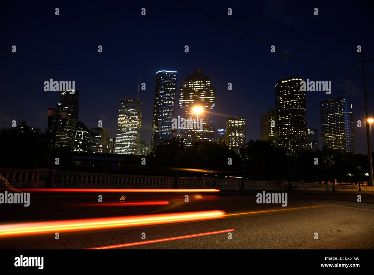 Downtown Houston Skyline at night with light trails Stock Photo Alamy