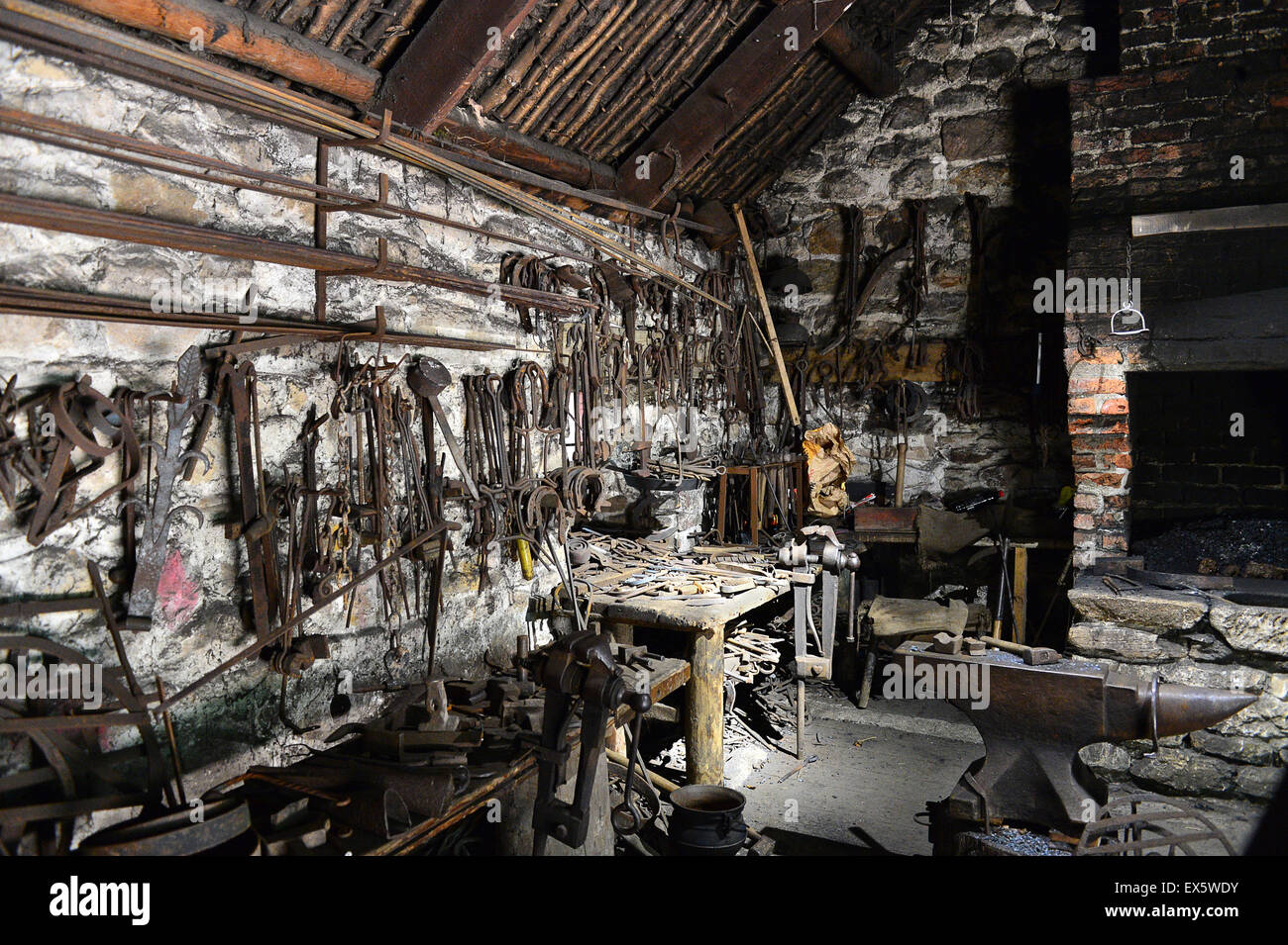Interior of 19th century Irish blacksmith's forge at the Ulster American Folk Park Stock Photo