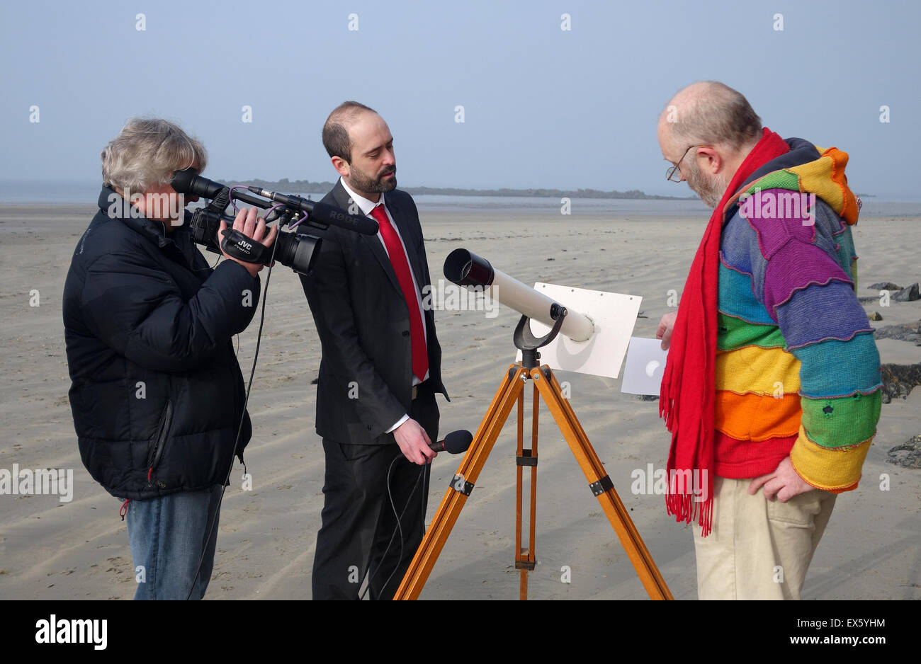 An Amateur Astronomer being interviewed by Journalists prior to an Eclipse of the Sun in Cornwall, UK Stock Photo