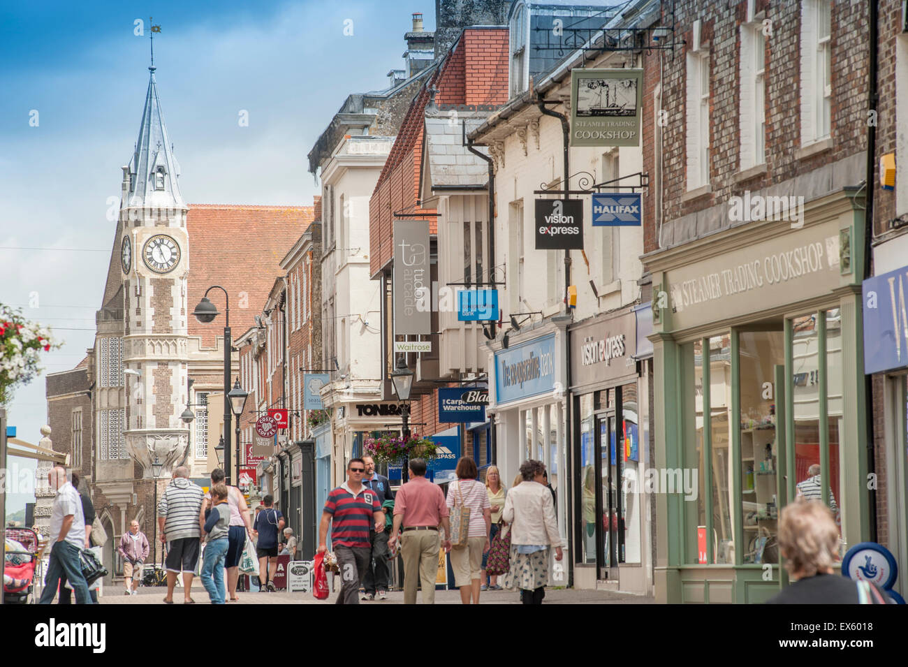 Looking north along New Street and Cornhill in Dorchester, Dorset, England, UK. Showing the clock tower of the Corn Exchange. Stock Photo