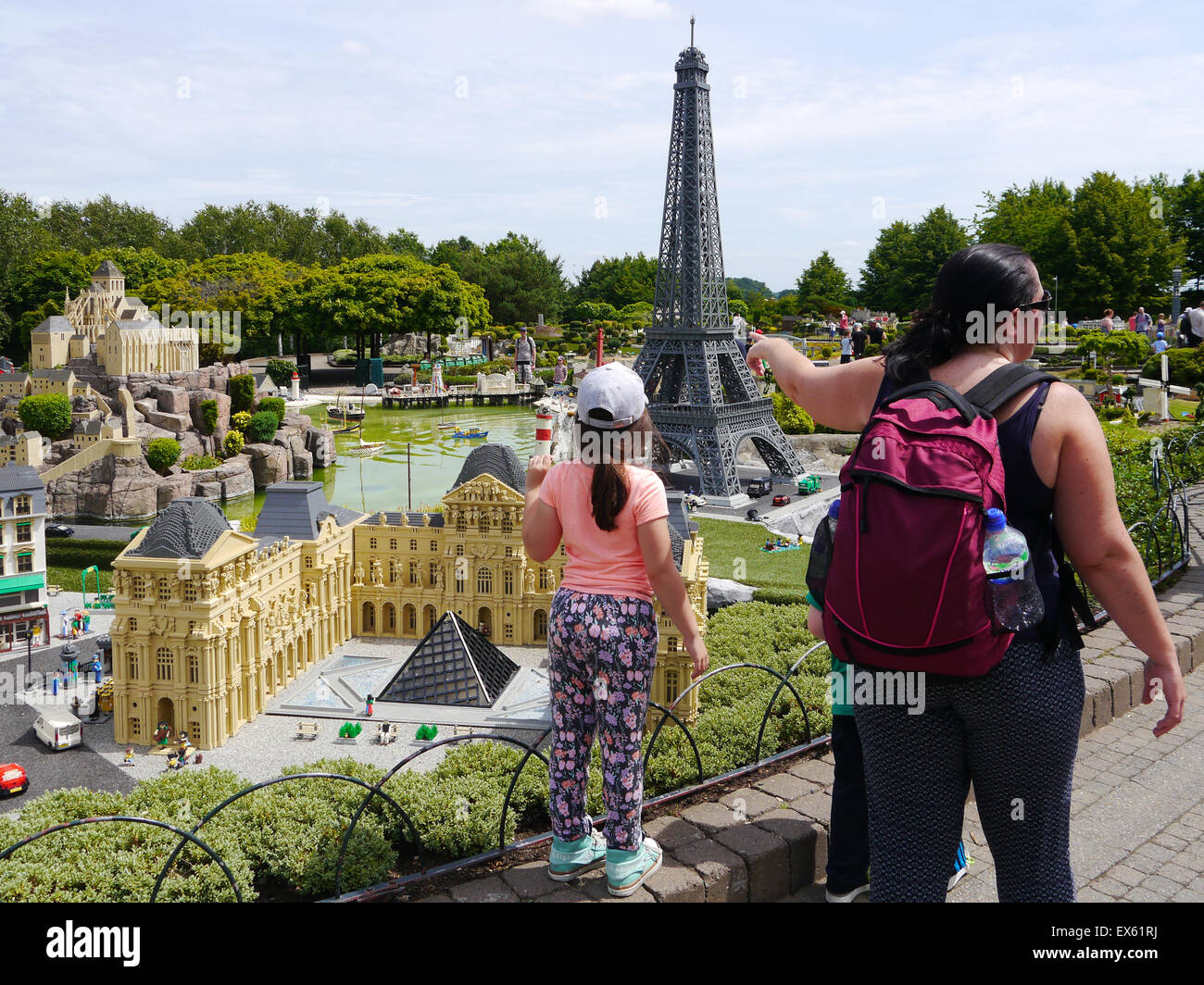 Visitors to Legoland Windsor admire the detailed models of famous landmarks from around the world made from Lego bricks. Stock Photo