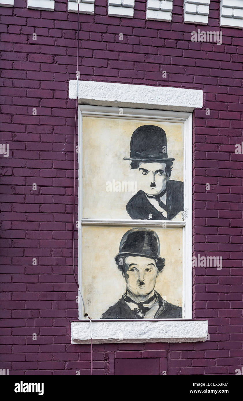 Charlie Chaplin graphic in window of Orpheum Theatre, Blairmore, Alberta, Canada Stock Photo