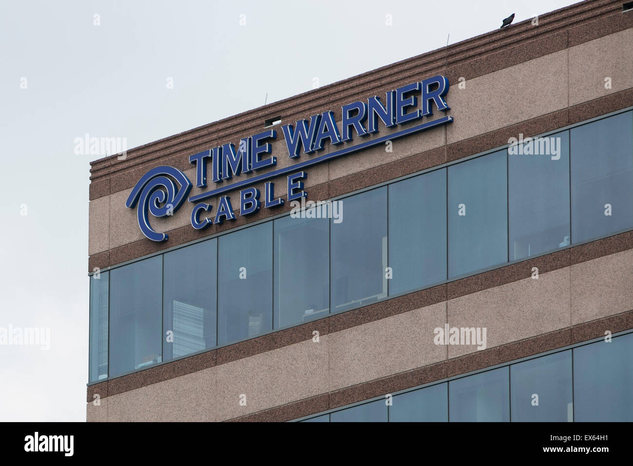A logo sign outside of an office building occupied by Time Warner Cable Enterprises Inc., in Herndon, Virginia. Stock Photo