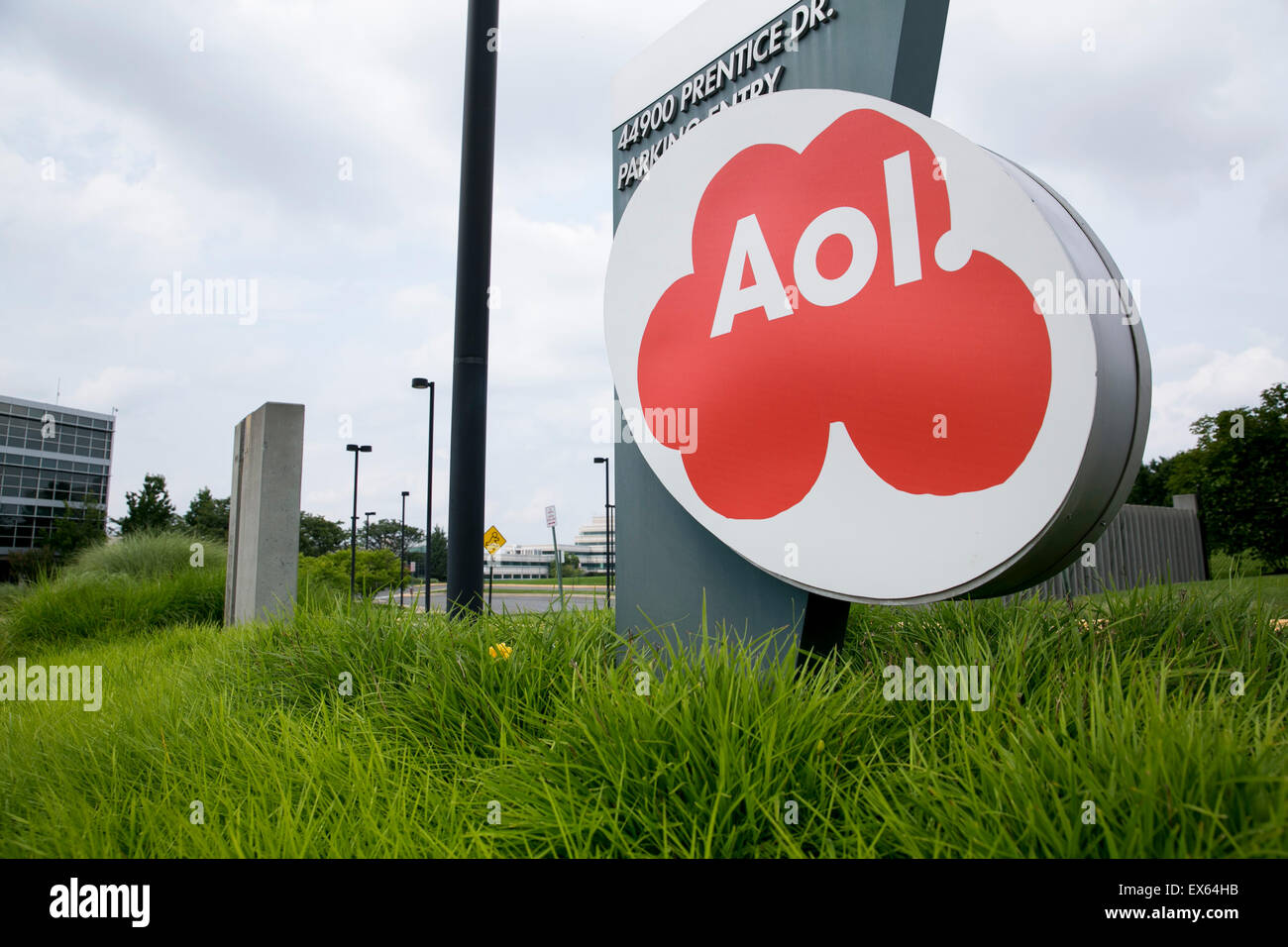 A logo sign outside of an office building occupied by AOL Inc., in