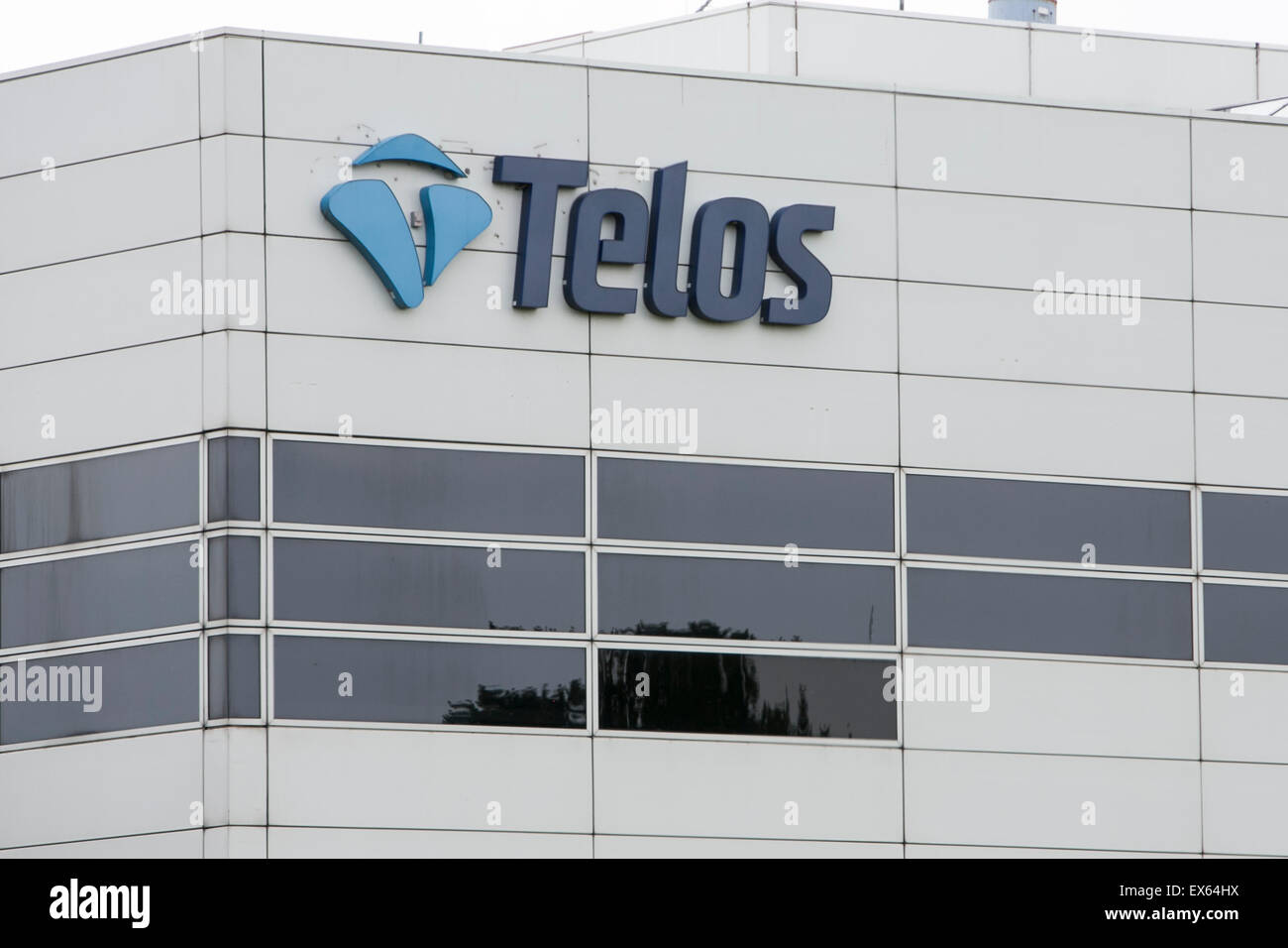 A logo sign outside of the headquarters of Telos Corporation, in Ashburn, Virginia. Stock Photo