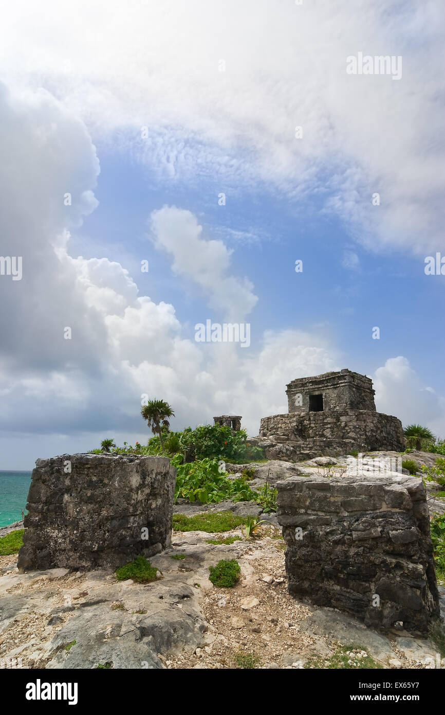 ruins of God of winds mayan temple on a cliff overlooking blue torquoise ocean in Tulum Quintana Roo, Mexico Stock Photo