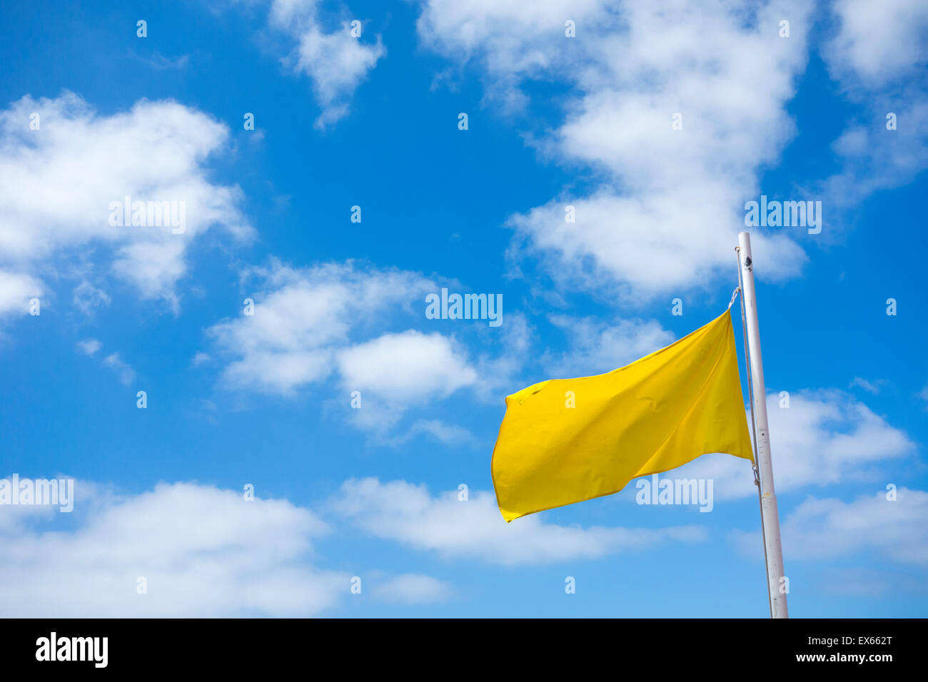 Yellow flag on beach hires stock photography and images Alamy