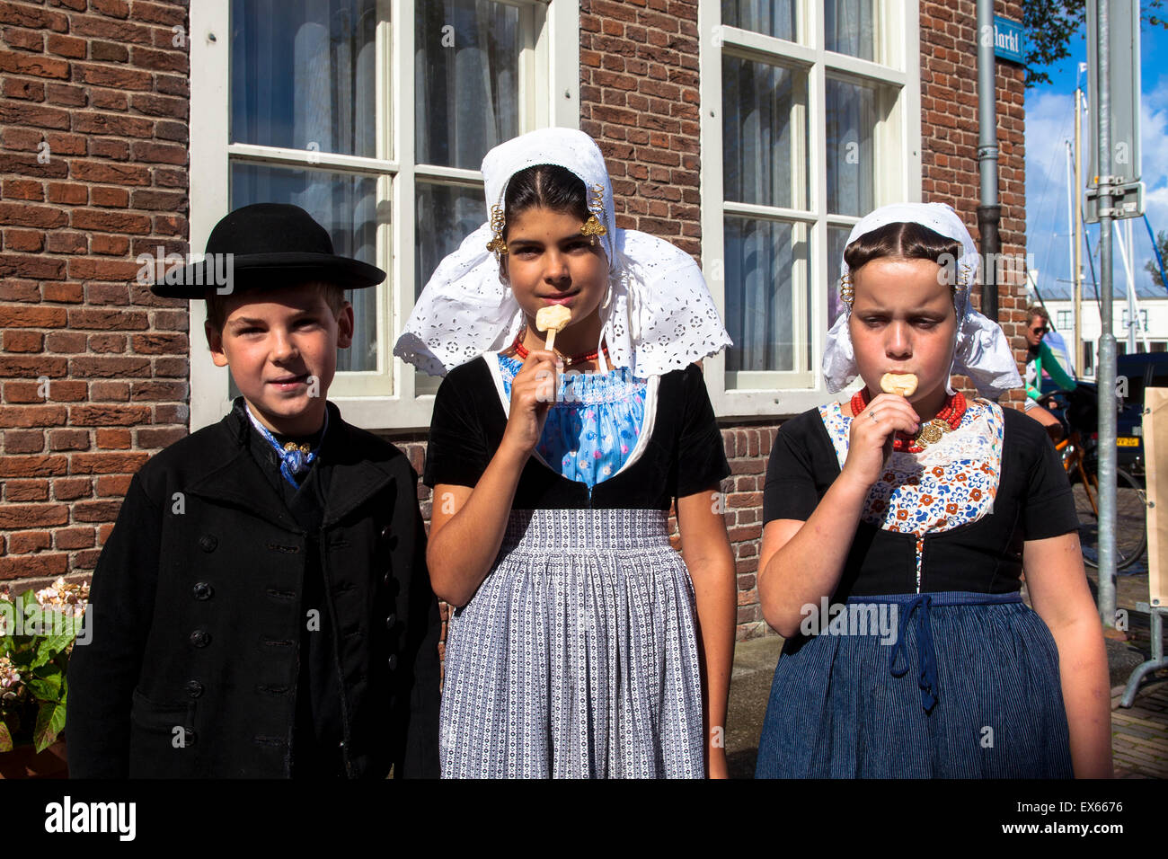 Netherlands, Zeeland, the village Veere on the peninsula Walcheren, children dressed in traditional costumes. Stock Photo