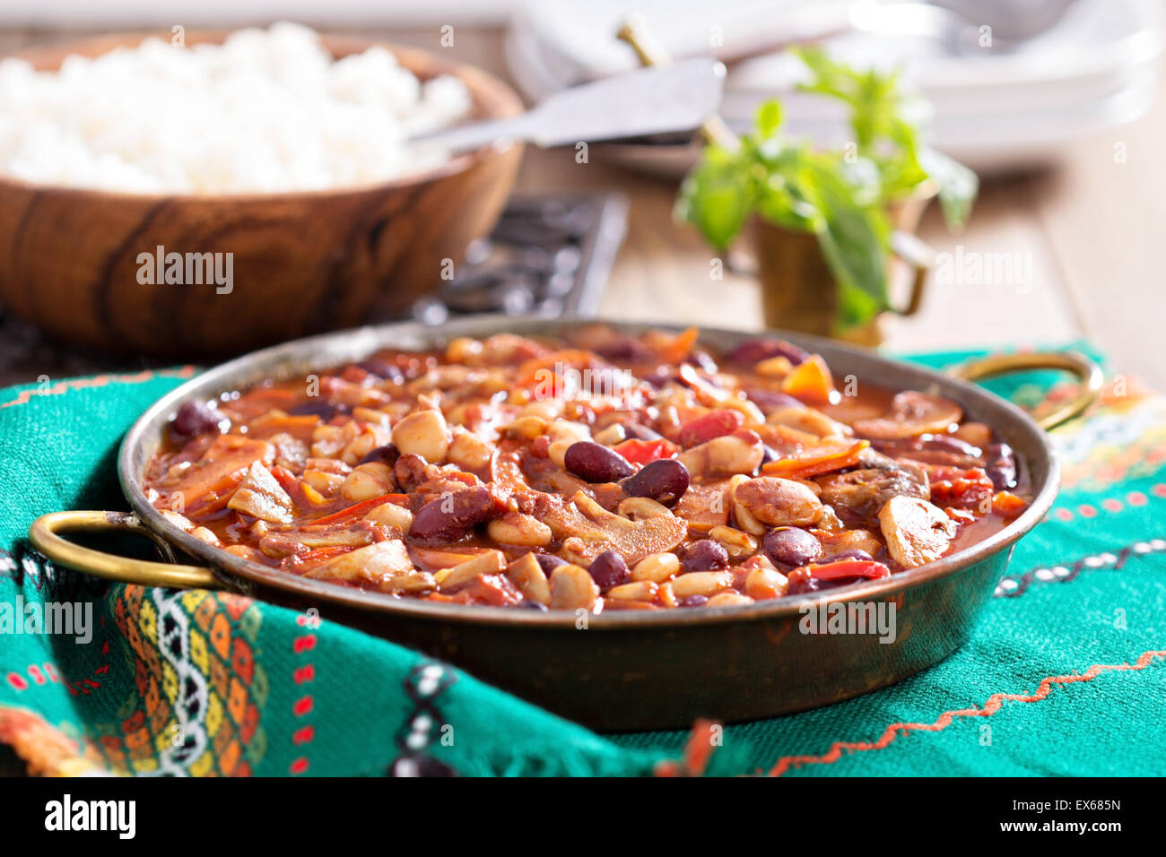 Vegan chili with beans, mushrooms, and vegetables Stock Photo