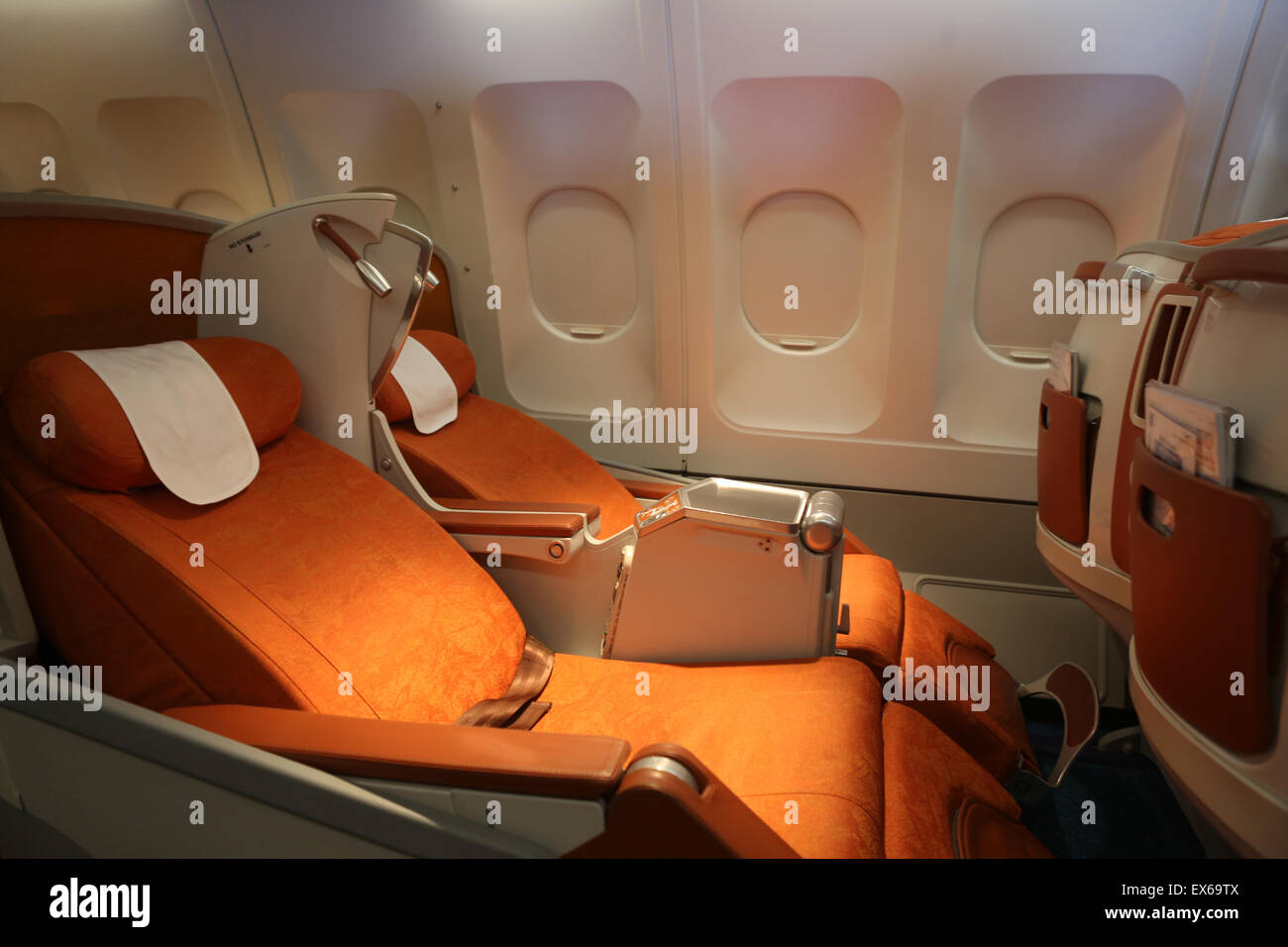Reclining seat airplane hires stock photography and images Alamy