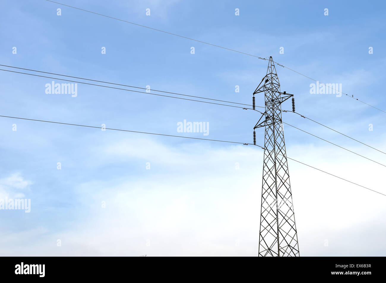 High voltage electric tower on sky background Stock Photo - Alamy