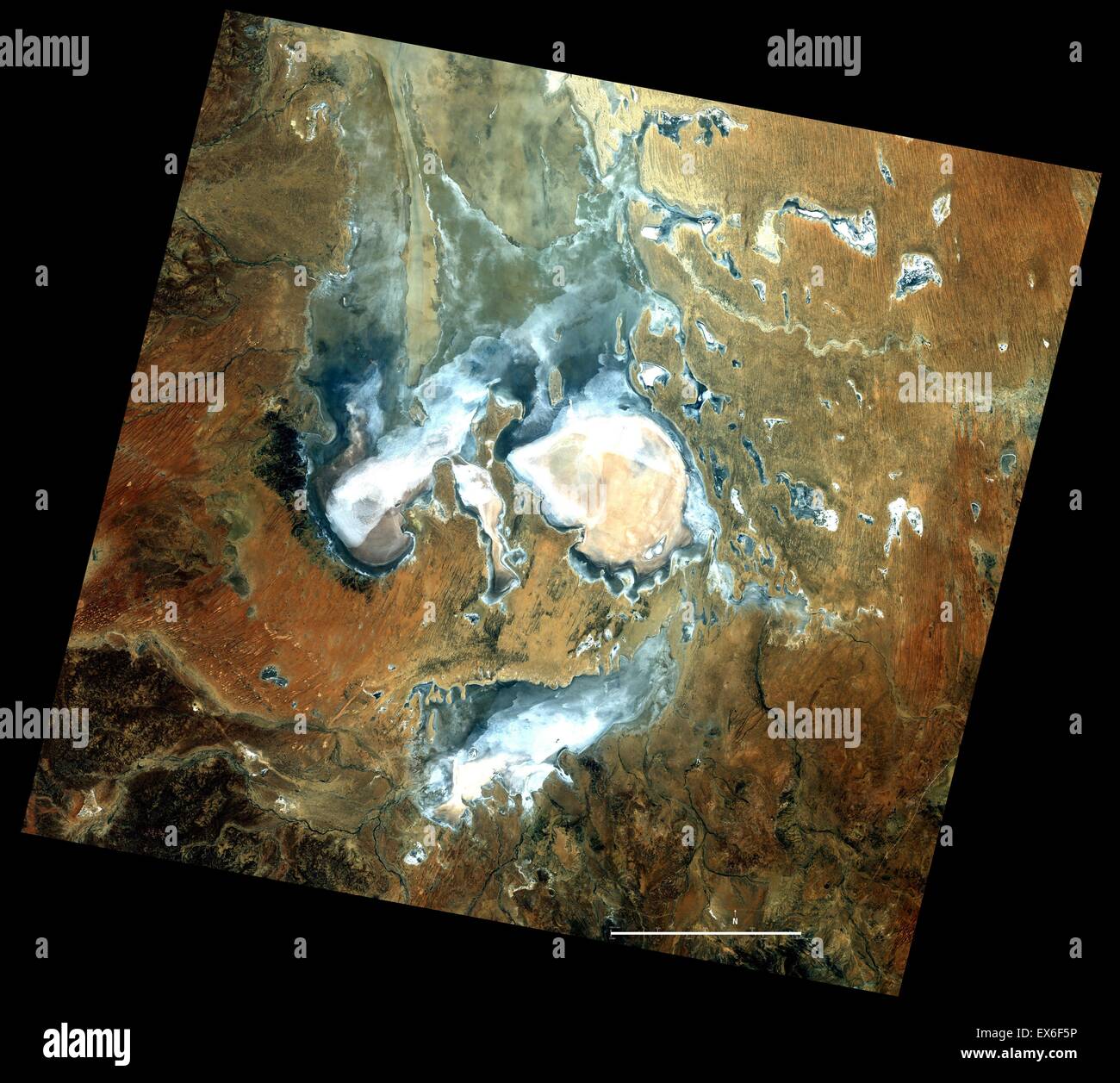 Lake Eyre is part of Lake Eyre National Park within the Lake Eyre Basin. The basin is one of the world's largest drainage system Stock Photo