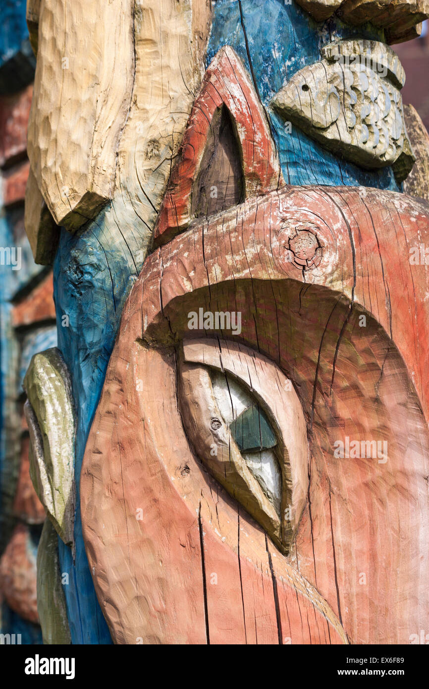 Detail of wooden carved totem pole in Boscombe Chine Gardens, Boscombe, Bournemouth, Dorset UK in June Stock Photo