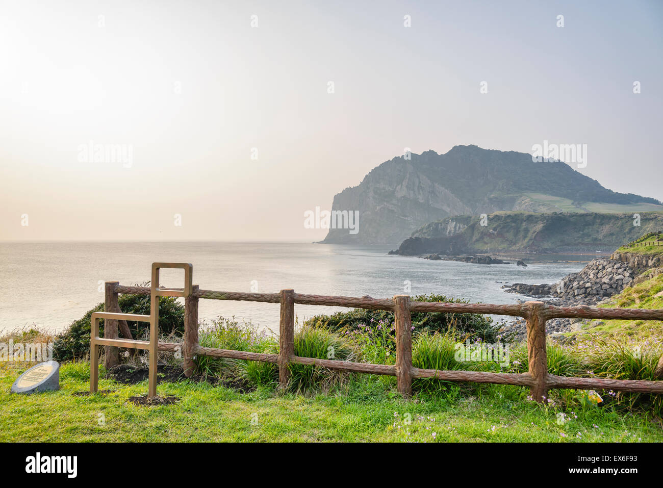 Landscape of Seongsan Ilchulbong with olle trail symbol in a morning. Stock Photo