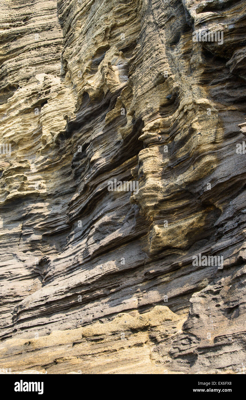 Multistory layered rough and strange sedimentary rocks in famous ...