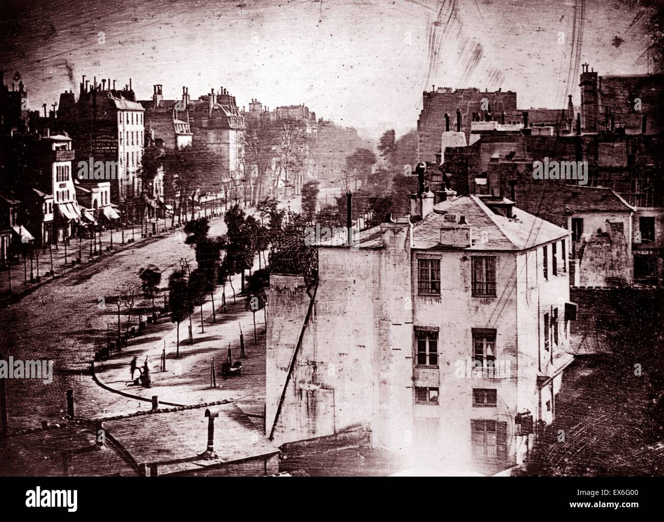Boulevard du Temple, Paris, France, photographed by Louis Daguerre. Believed to be the earliest photograph showing a living person. Only the two men near the bottom left corner, one apparently having his boots polished by the other, stayed in one place lo Stock Photo