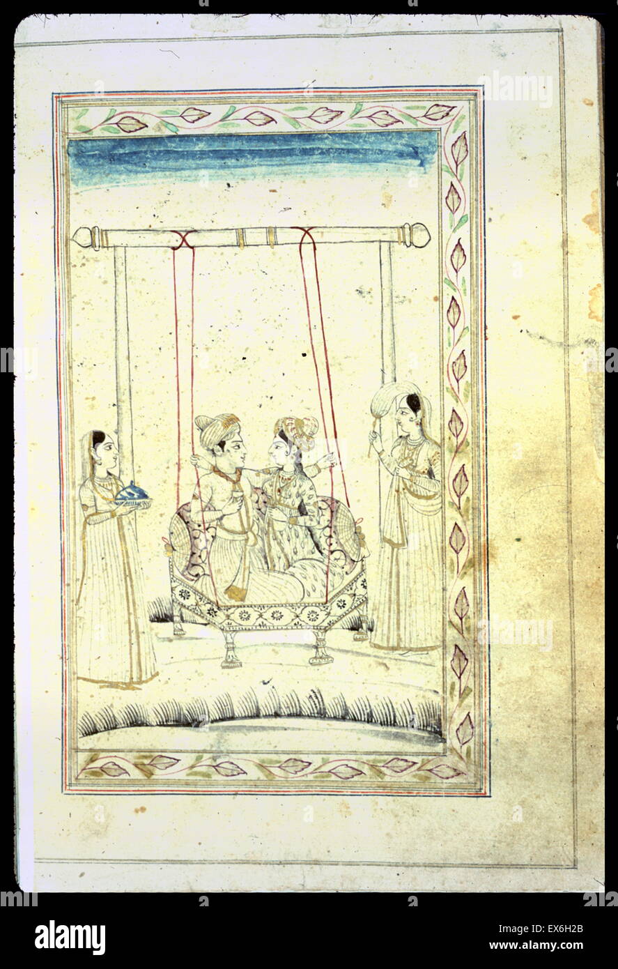 late Mughal style miniature drawing in black ink with gilt and blue and red accents. A man and a woman sit on a swing, partially embracing while two female attendants stand on either side Stock Photo