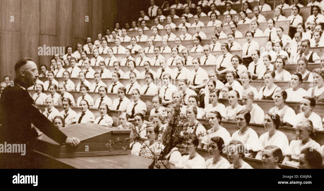 Heinrich Himmler addresses a group of female Hitler youth 1937 Stock Photo