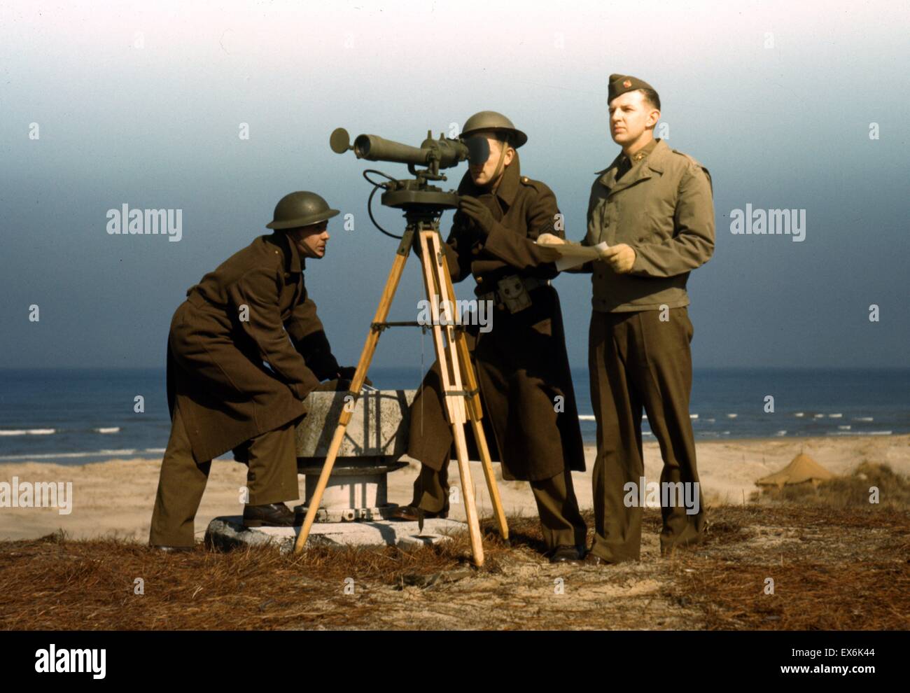 Colour photograph of the men of Fort Story operating an azimuth ...