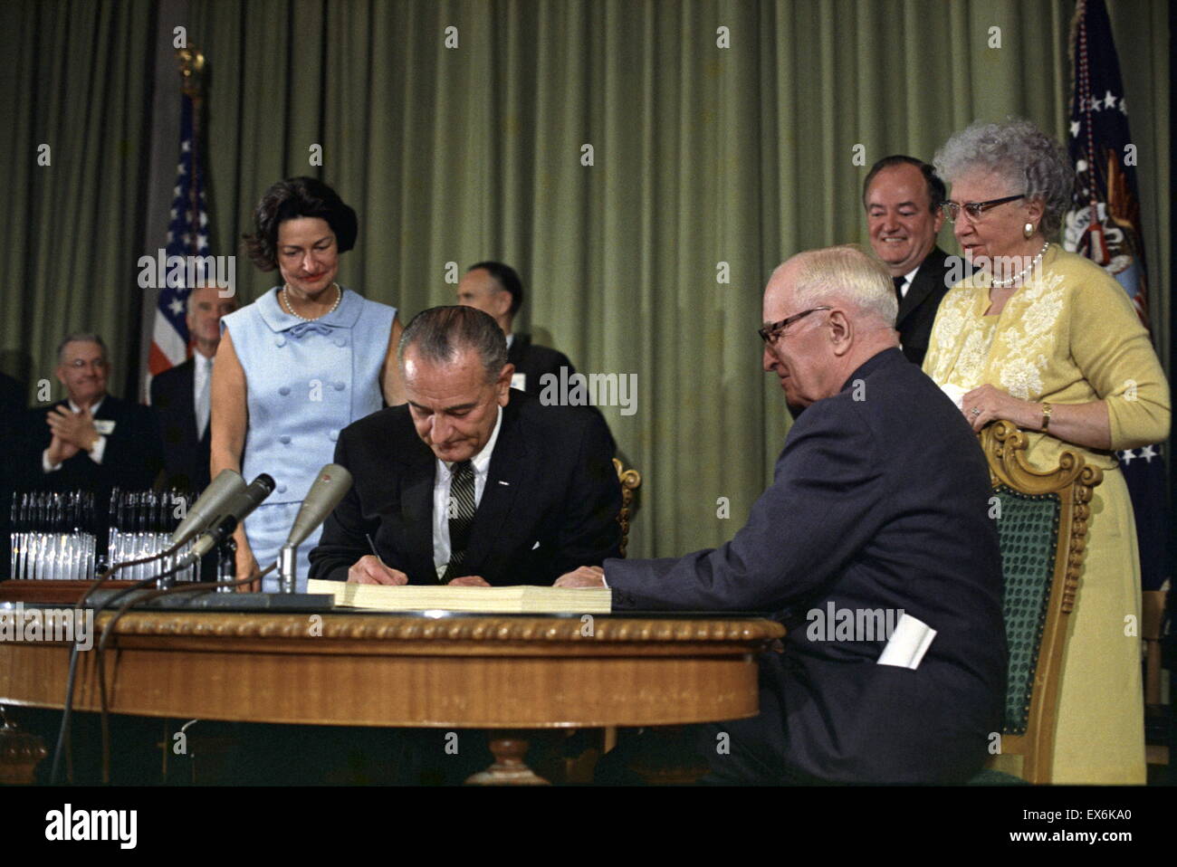 President Lyndon Johnson signing Medicare Bill, Independence, Missouri, Harry Truman looks on , 30 Jul 1965 Stock Photo