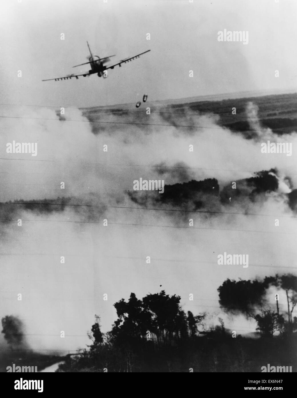 Photograph of a air raid attack on a Vietcong hideout near Cantho, South Vietnam. Bomb was dropped from a Vietnamese Air Force A-1E Sky raider. Dated 1967 Stock Photo
