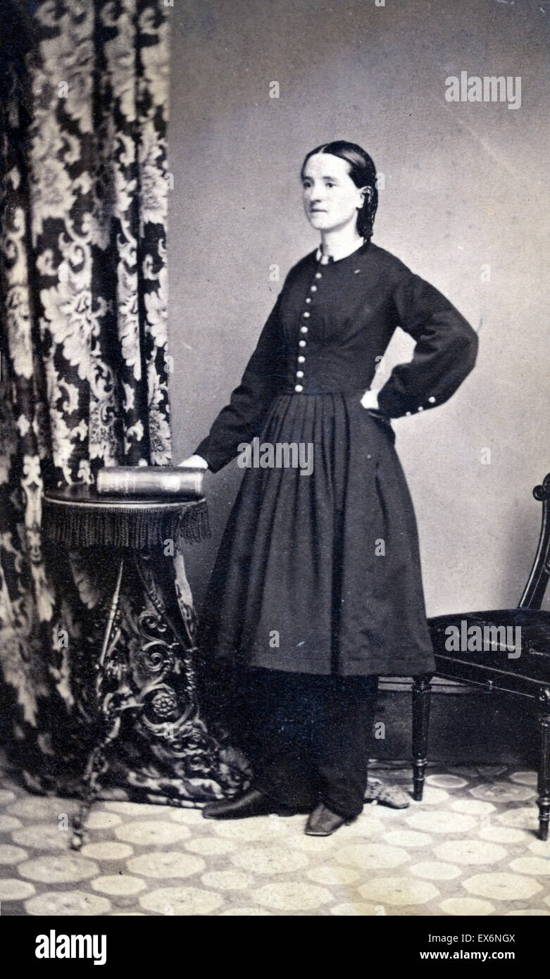 Photograph showing the American Civil War female surgeon Mary E. Walker in a full-length studio portrait 1865 Stock Photo