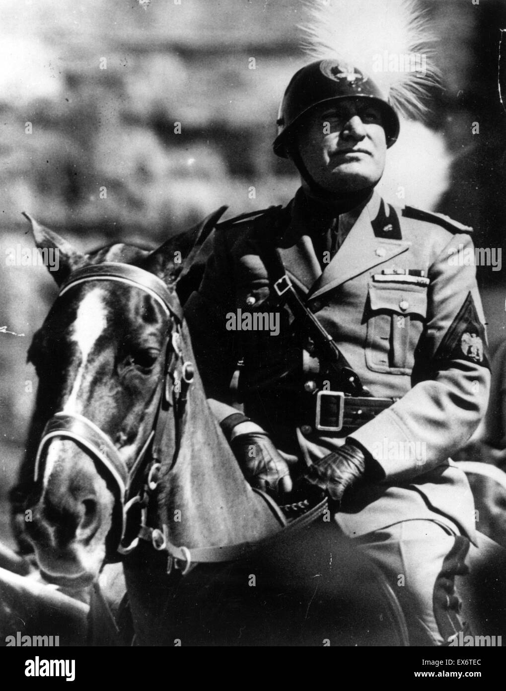 Benito Mussolini (1883 – 28 April 1945) Italian politician, journalist, and leader of the National Fascist Party on horseback in uniform 1936 Stock Photo