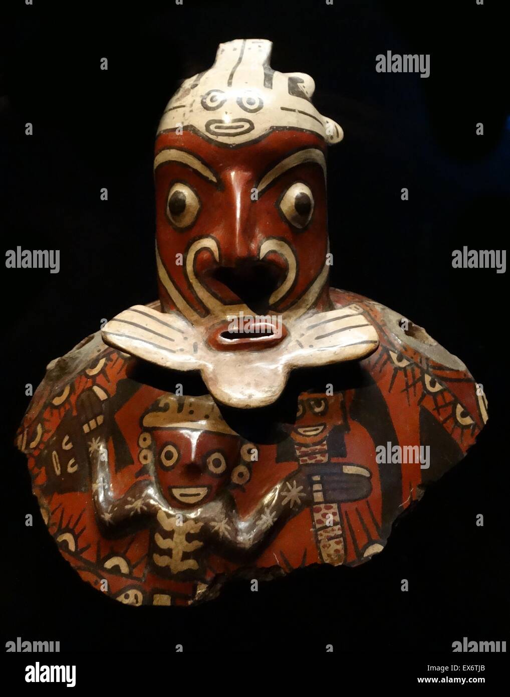 Anthropomorphic jar. From the rituals of life and death from the Nasca culture. The culture is known for its prolific ceramic production and a colour palette that includes the richest colours of the pre-Hispanic Andes. Stock Photo