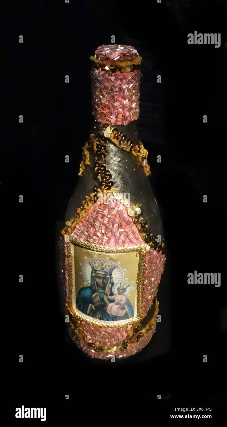 Libation bottle. A libation is a drink that is poured out as an