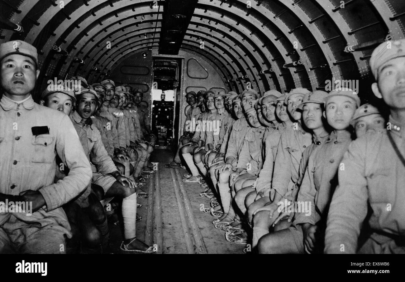 The interior of the DC-3 with its complement of Chinese soldiers en route to India on their task missions being transported by United States Army Air force flyers. 1943. Stock Photo