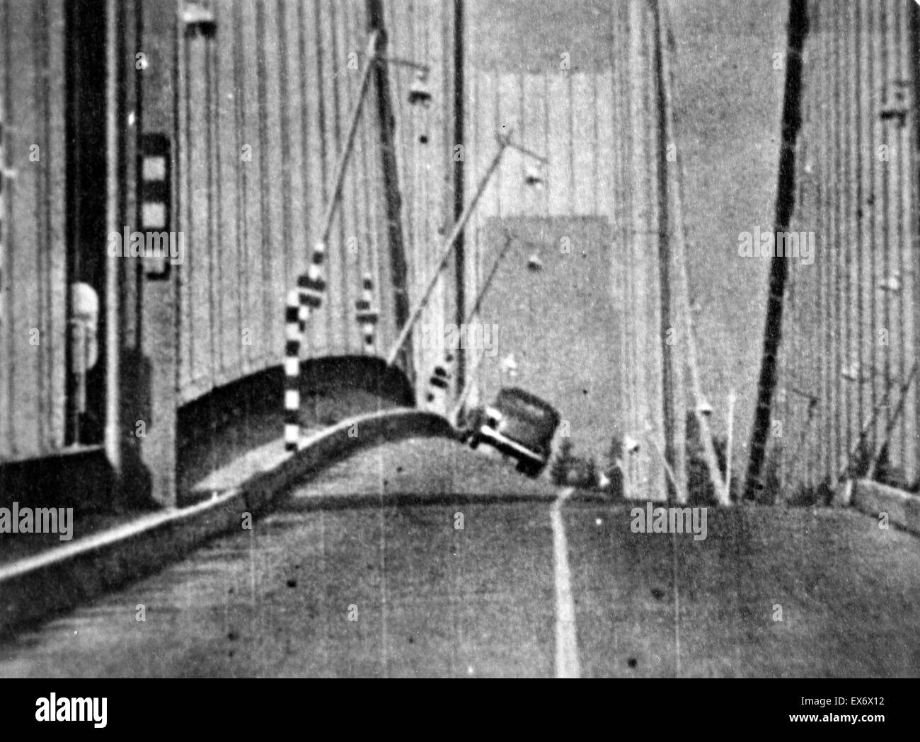 Photographic print of the original Tacoma Narrows Bridge before it's wind induced collapse. The print depicts the physical phenomenon known as aerolastic flutter, which is the dynamic instability of an elastic structure in a fluid flow, caused by positive Stock Photo