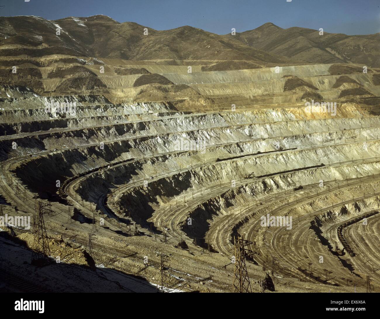 View of the Utah Copper Company with open-pit mine workings at Carr Fork, as seen from the railroad, Bingham Canyon, Utah. 1942. Stock Photo