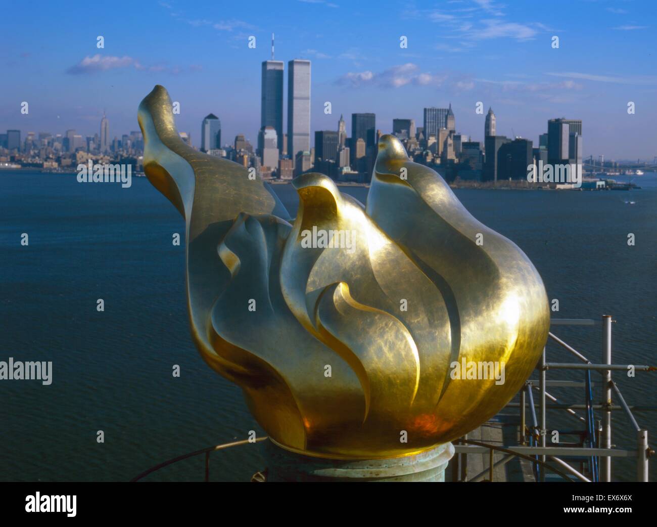 Detail of flame of the statue of Liberty; Manhattan skyline Twin Trade